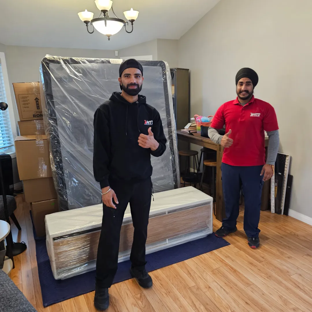 Shrink‑wrapping my mattress before the long-distance haul.